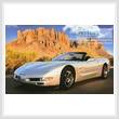 cross stitch pattern Sports Car with Mountains